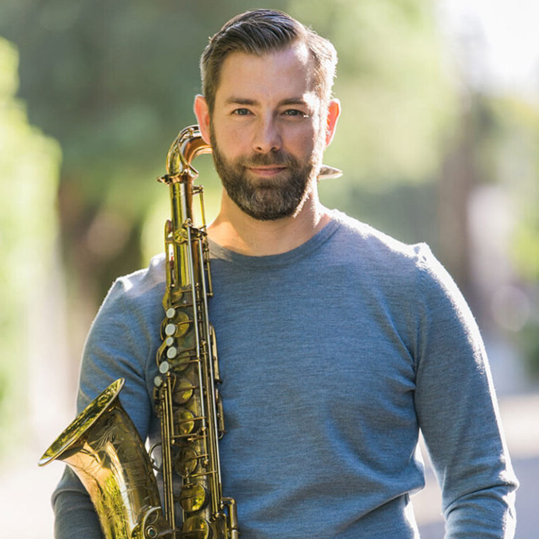 Jeff Pifher ’07E with his saxophone